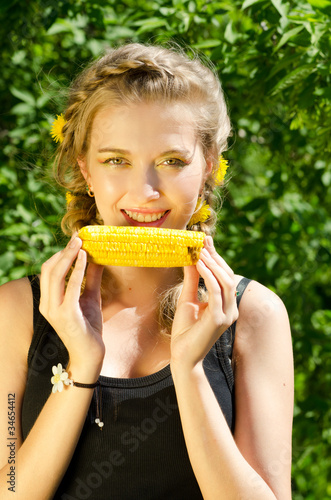 woman eating corn-cob