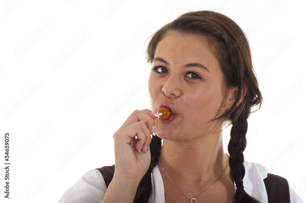 Frau Im Drindel Lutscht Einen Lutscher Stock Foto Adobe Stock