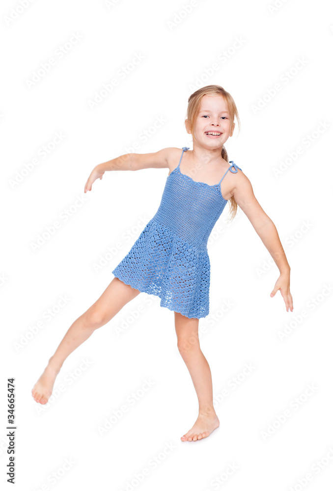 Fototapeta premium funny pretty little girl in blue dress