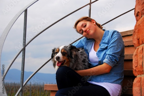 Friendship between young girl an dog