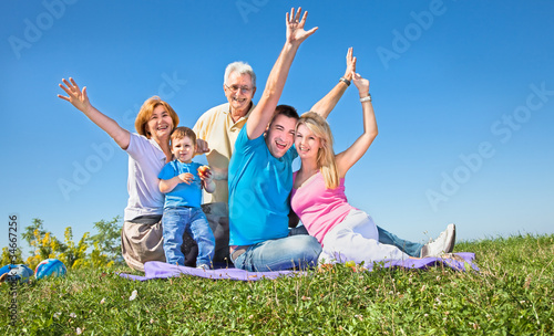 Happy family wave their hands