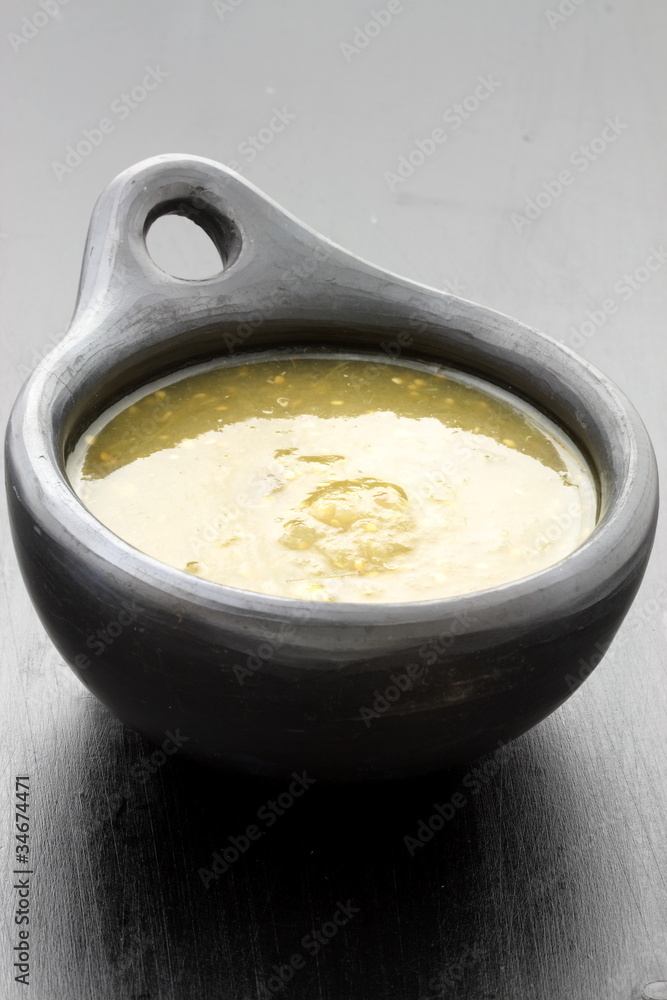 tomatillo sauce in colombian clay dish tomatillo sauce in colombian clay dish