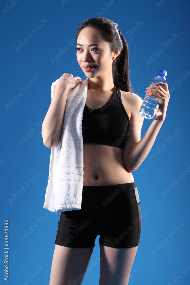 Happy beautiful Asian girl after fitness workout Happy beautiful Asian girl after fitness workout