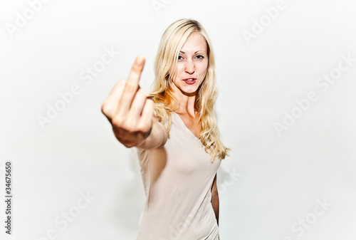 Quadro em tela girl showing the finger, while saying fuck you!