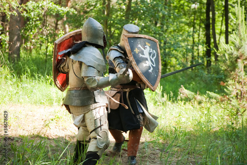 Two knights is fighting at forest