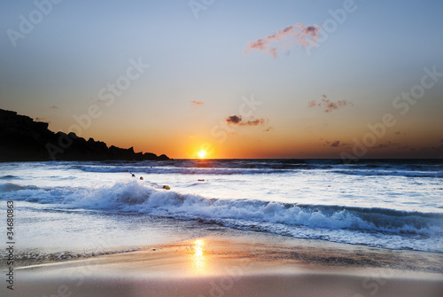 Ghajn Tuffieha Beach at sunset photo