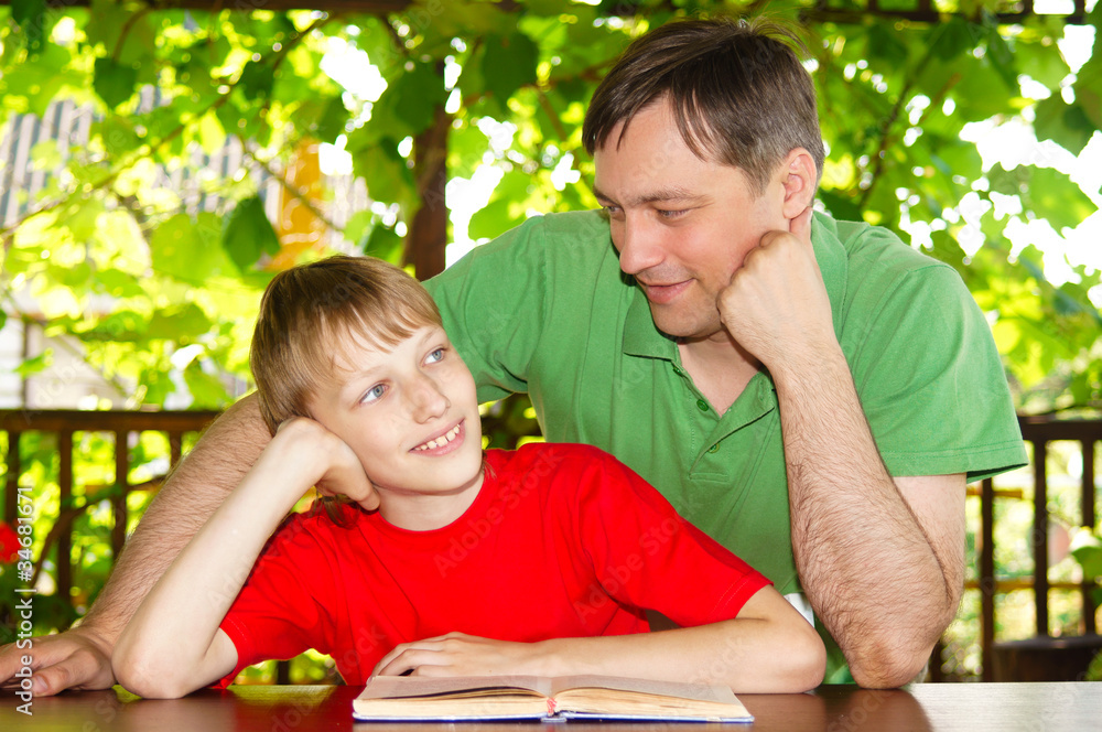 dad with son reading dad with son reading