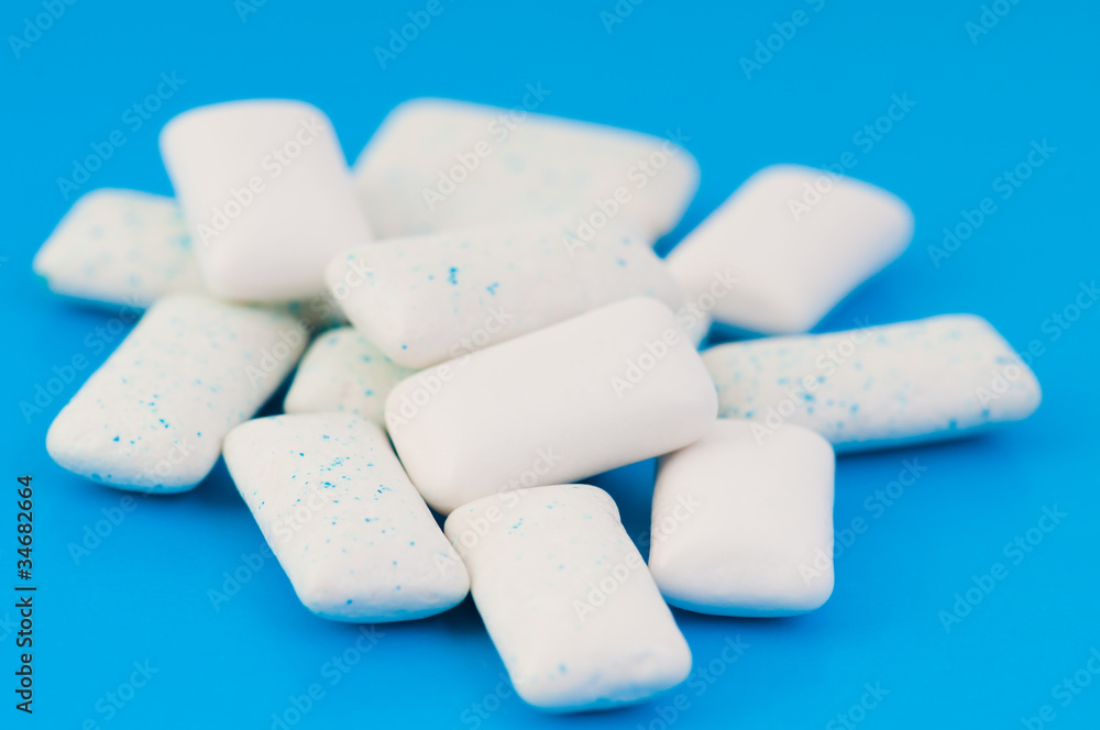 Chewing gums on blue Chewing gums on blue