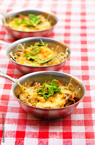 Baked meat and mushrooms with cheese