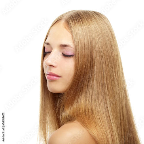 Pretty girl with long hair on white