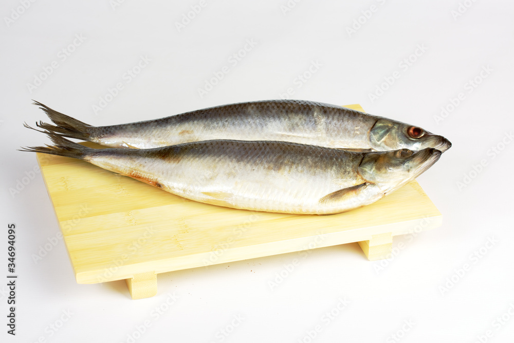 Salted herring isolated on the white background Salted herring isolated on the white background