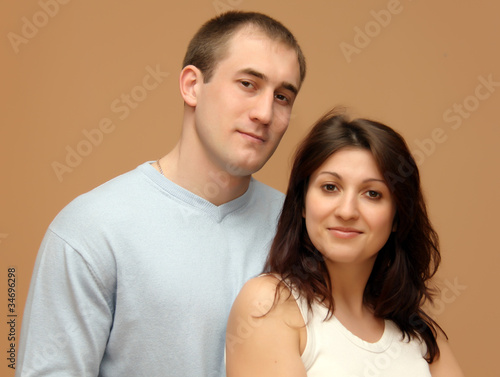 Portrait of a beautiful young happy smiling couple