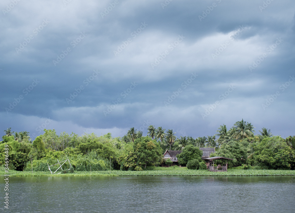 river house during monsoon in thailand