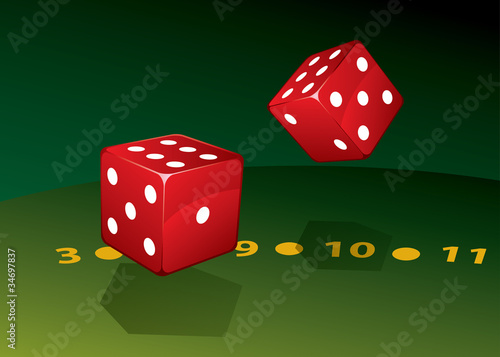 Two dice on green table