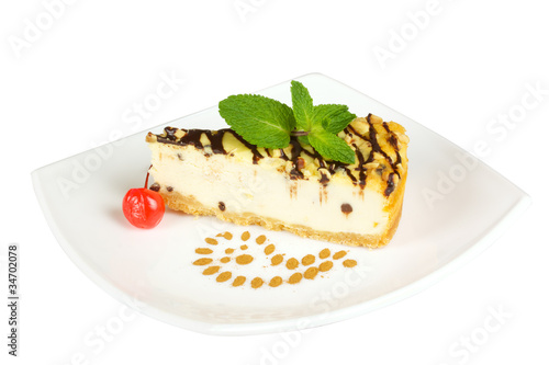 Gourmet slice of cheesecake on the white background