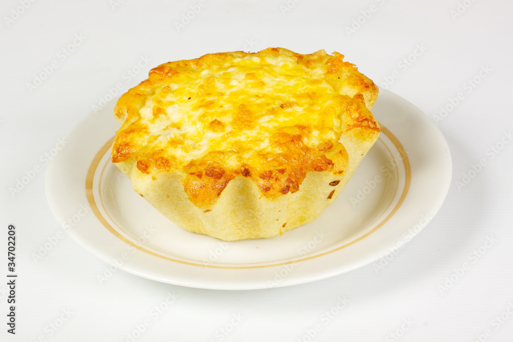 ndividual meat pie with potato topping. ndividual meat pie with potato topping.