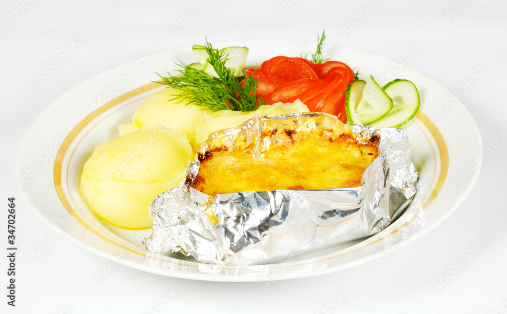 Baked Potato filled with meat and cheese on white plate