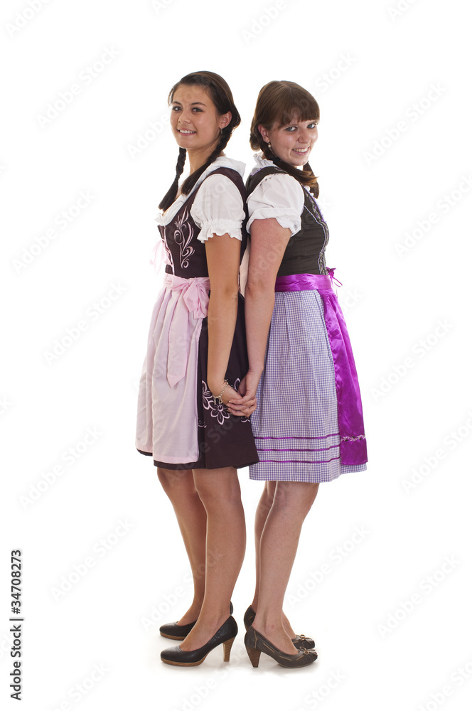 Zwei Frauen in Tracht Rücken an Rücken Zwei Frauen in Tracht Rücken an Rücken