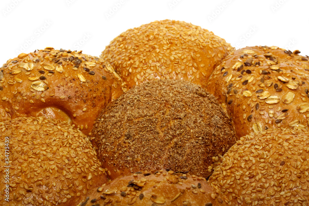 Loaf of bread and rolls isolated on white Loaf of bread and rolls isolated on white