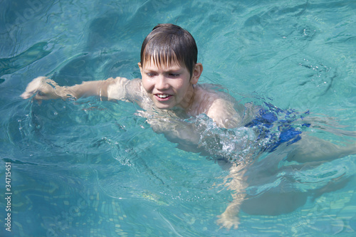 bkid in a swimming pool