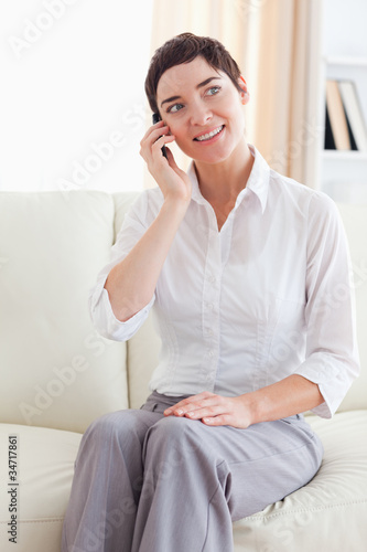 Portrait of a Joyful woman with a cellphone