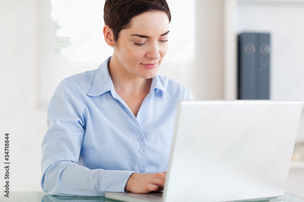 Smiling Businesswoman with a laptop Smiling Businesswoman with a laptop