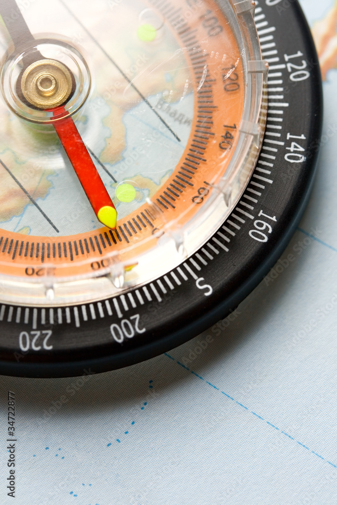 Compass on map background Compass on map background