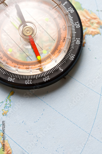Compass on map background
