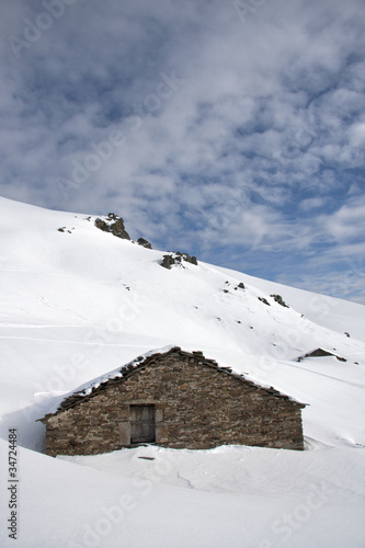 Mountain cabin in the snow