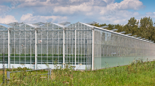 Close up of the exterior of a modern greenhouse complex