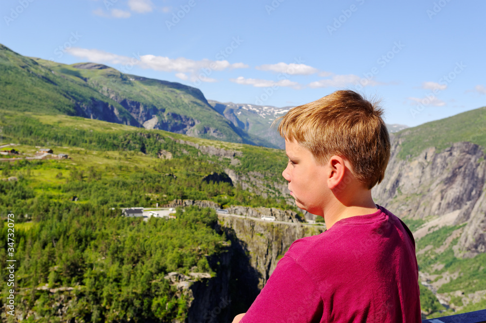 Boy and mountains.