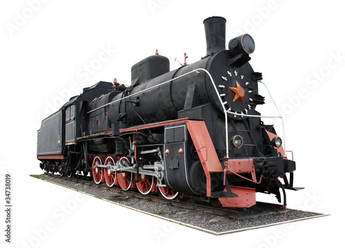 Old black locomotive isolated