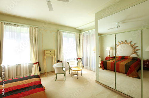 interior luxury apartment, comfortable suit, bedroom