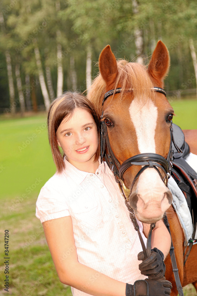 Obraz premium Mädchen und ihr Pony