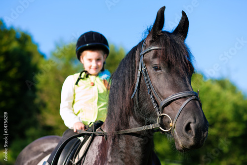 Little girl with horse