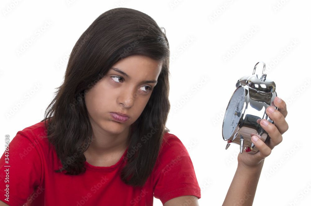 Fototapeta premium teenage girl and the alarm clock