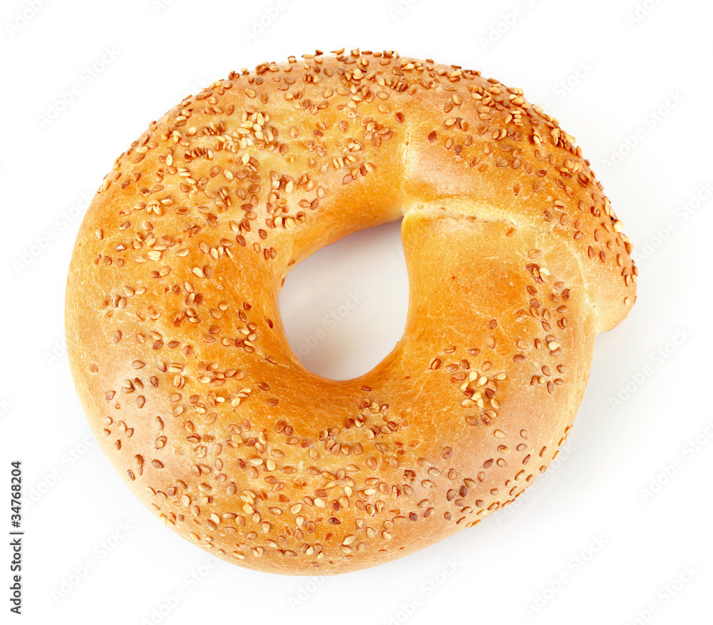 Tasty bagel with sesame seeds isolated on white Tasty bagel with sesame seeds isolated on white