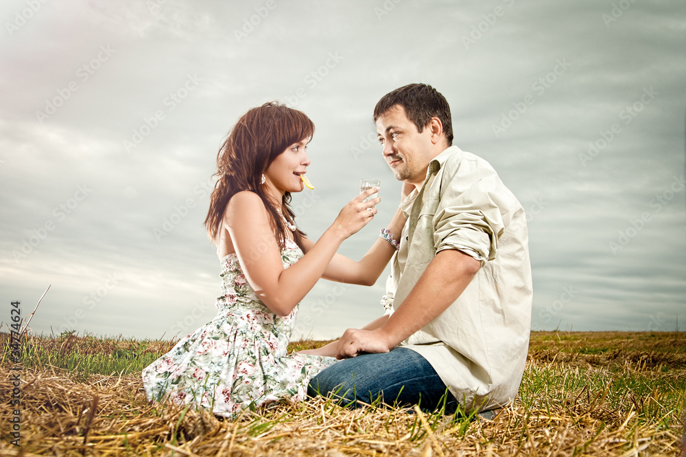 The woman and the man in the field The woman and the man in the field