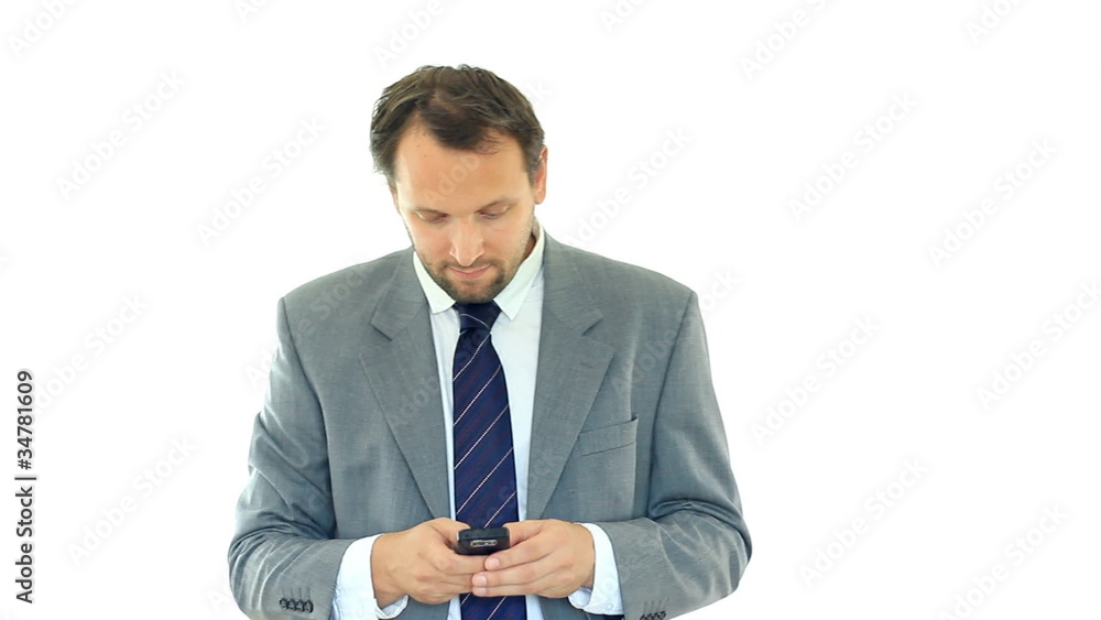Businessman texting, sending sms and smiling, isolated on white Businessman texting, sending sms and smiling, isolated on white