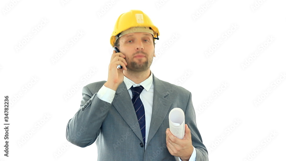 Construction engineer talking on mobile phone, isolated on white Construction engineer talking on mobile phone, isolated on white