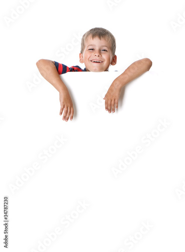 Boy holding a banner