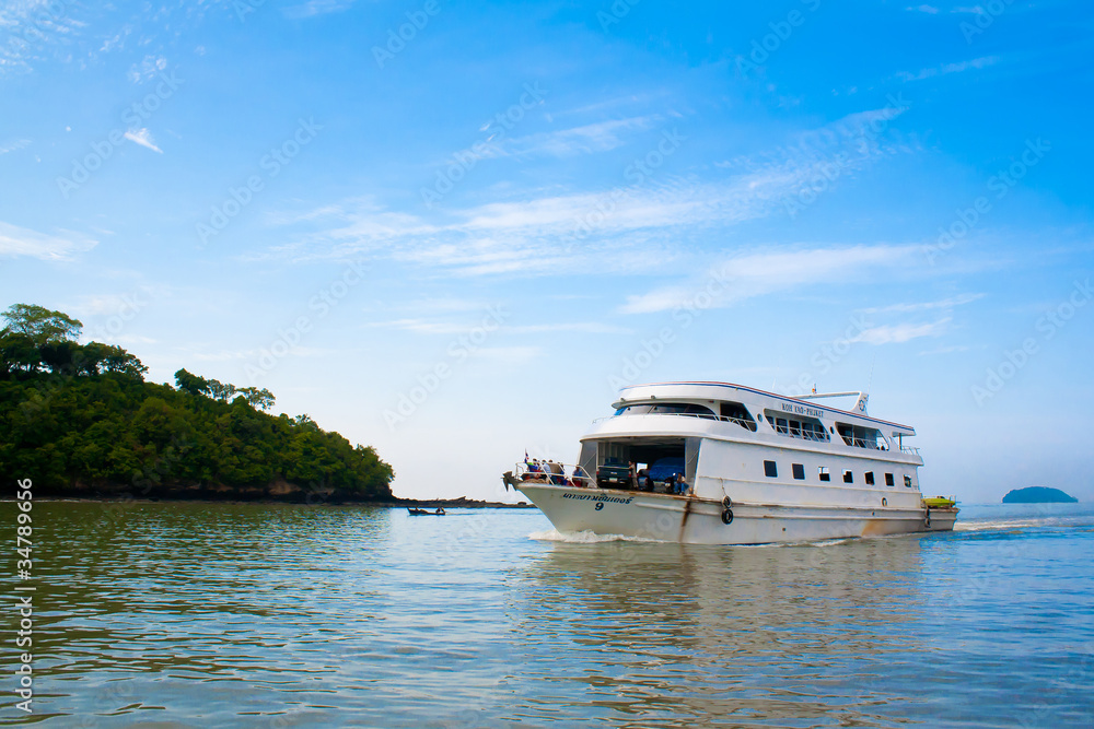 Typical touring ferry boat in the sea,Phuket,Thailand Typical touring ferry boat in the sea,Phuket,Thailand