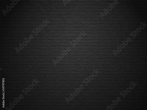 Dark metal mesh with spotlight hitting on it