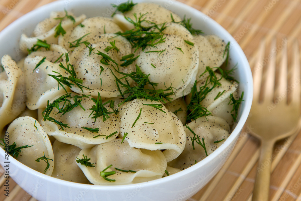 Pelmeni - traditional russian dish. Pelmeni - traditional russian dish.