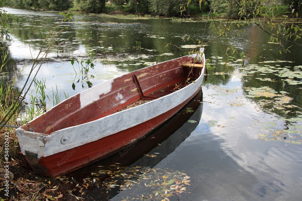 Fishing boat at river in Russia