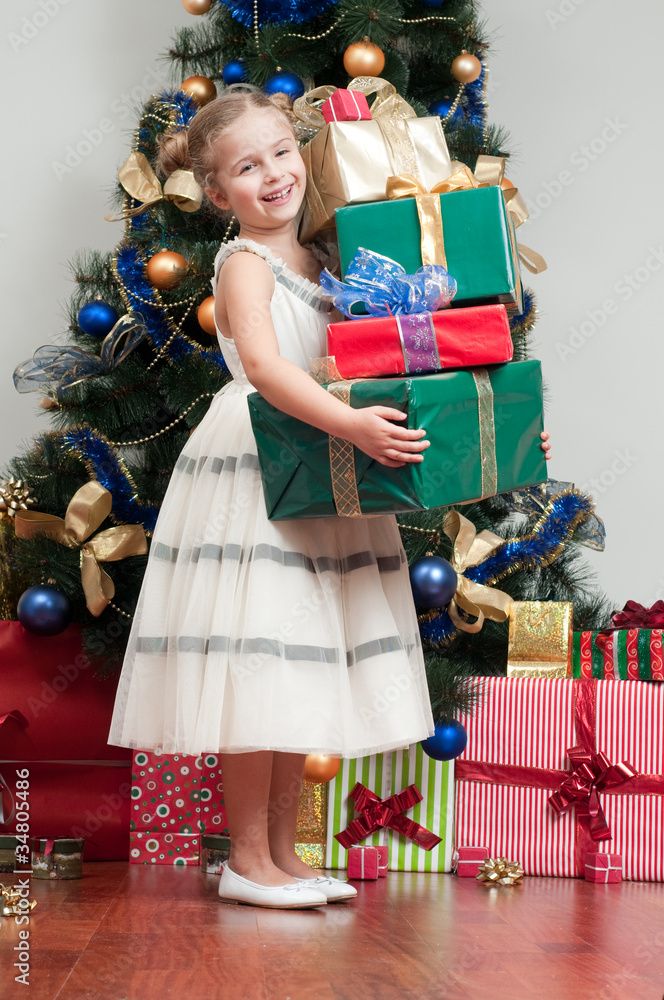 Happy Christmas - little girl with Christmas presents