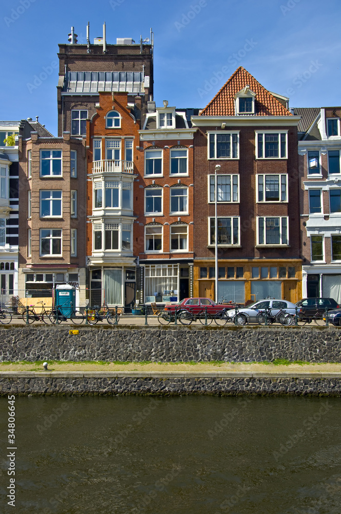 Fototapeta premium Classic amsterdam view. Residential homes