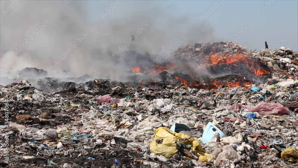 Burning garbage dump, pollution