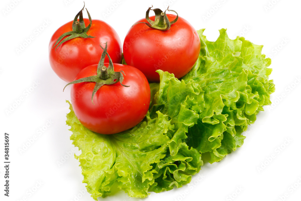 Three red tomatoes on white Three red tomatoes on white