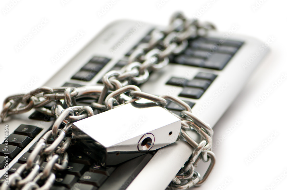 Concept of internet security with padlock and keyboard Concept of internet security with padlock and keyboard